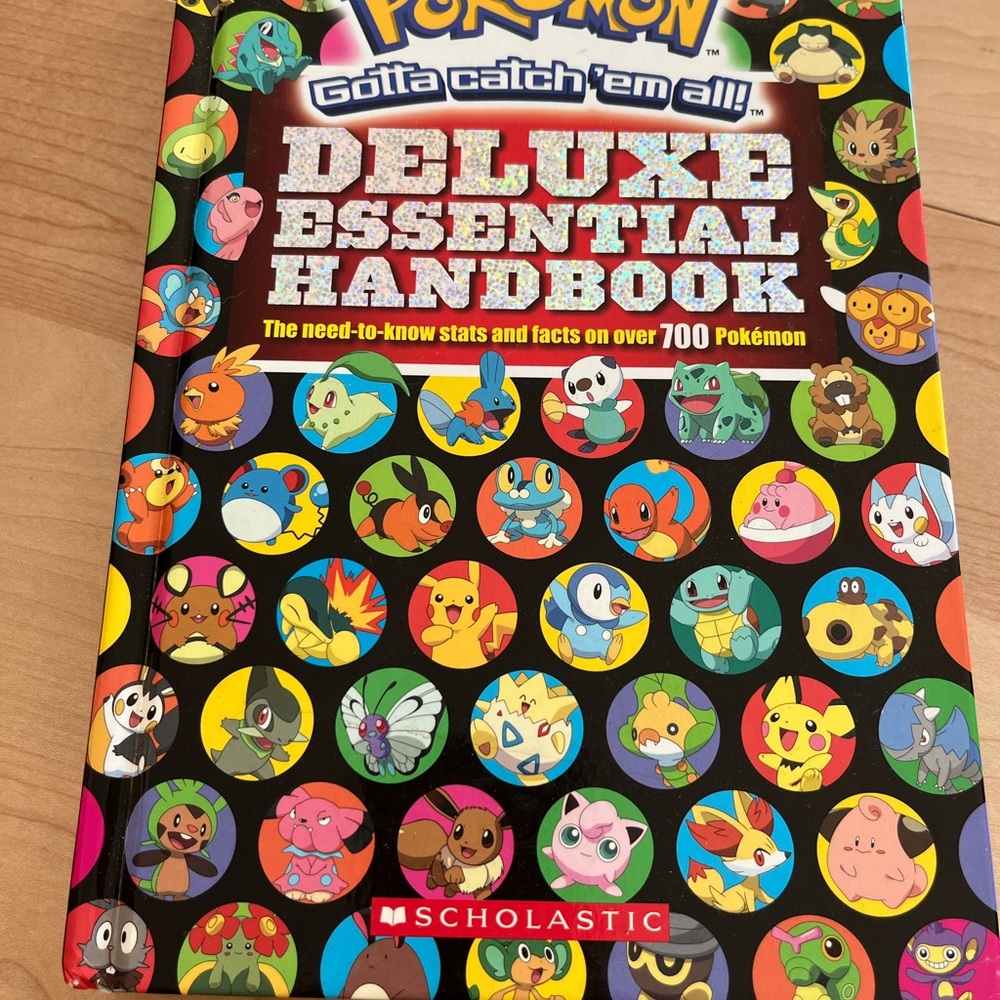 Pokemon Deluxe Essential Handbook - Red, Black, White